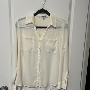 Cream colored EXPRESS portofino shirt. Size Medium.